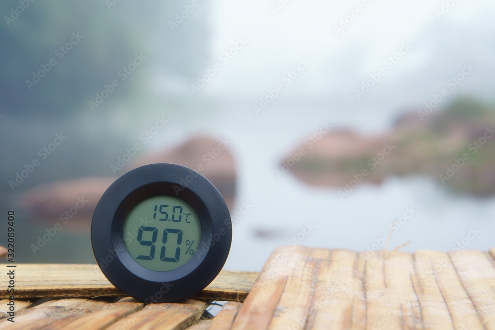 air thermometer and hygrometer or humidity on 15 degrees temperature to cool on wooden carriage and river or stream with tree in green jungle for summer or winter holiday relax and vacation travel air thermometer and hygrometer or humidity on 15 degrees temperature to cool on wooden carriage and river or stream with tree in green jungle for summer or winter holiday relax and vacation travel