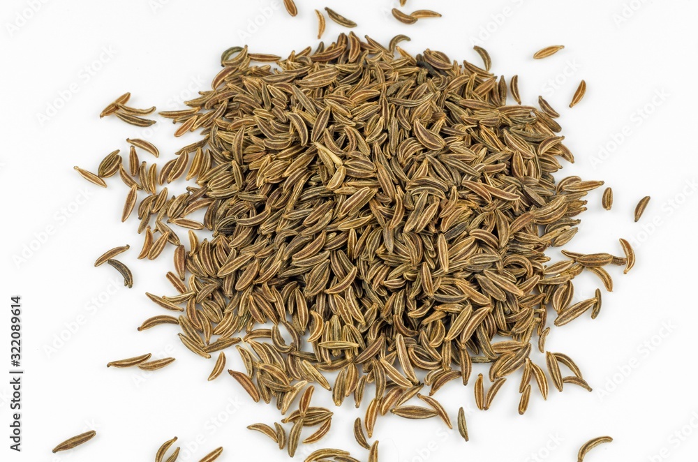 cumin seeds seasoning for meals and soups on a white background