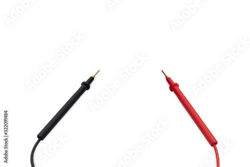 Positive and negative multimeter probe or pin plug isolated on white background, industrial and education concept.