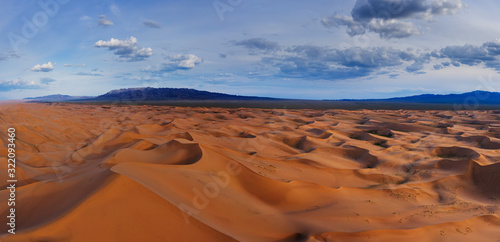 Sand dunes in Gobi Desert at sunset