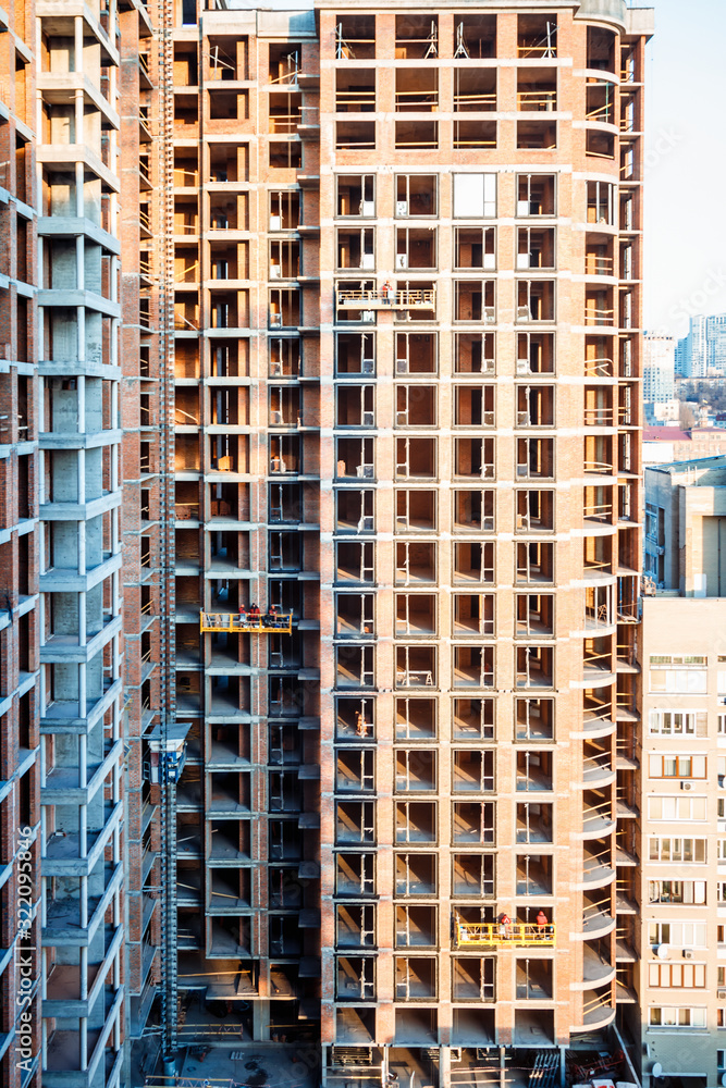 Obraz premium Construction of a high-rise building. Construction site in the city centre