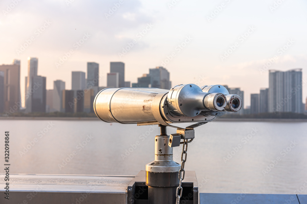 telescope on background of blue sky and clouds telescope on background of blue sky and clouds