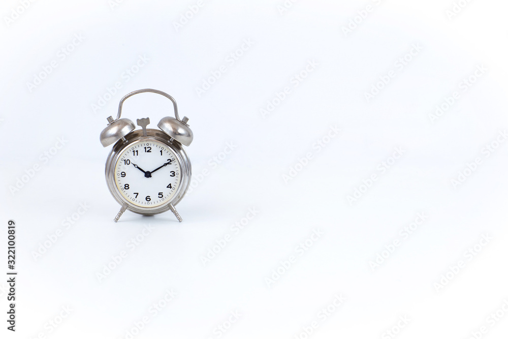 on a white background alarm clock. Free space for text on a white background alarm clock. Free space for text