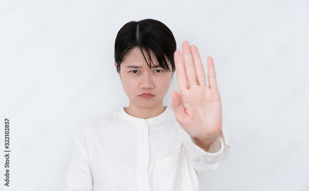 woman outstretched hand showing stop gesture woman outstretched hand showing stop gesture