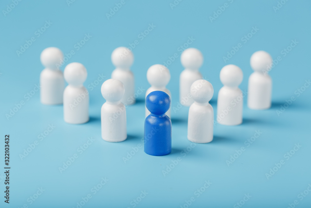 The leader in blue leads a group of white employees to victory, HR, Staff recruitment. The concept of leadership.