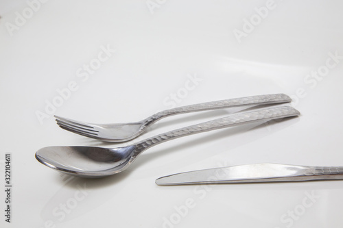 steel spoon silver placed on an isolated background,..The equipment for the kitchen dishware meal breakfast,