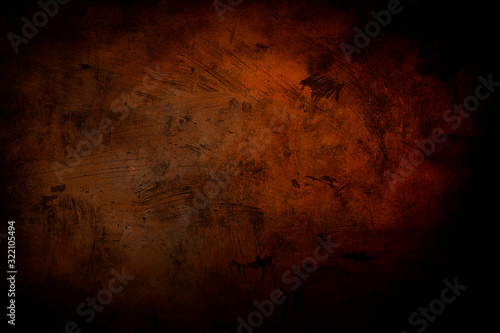 grunge reddish background with black vignette borders