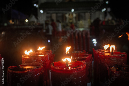 Red candles brightening at night