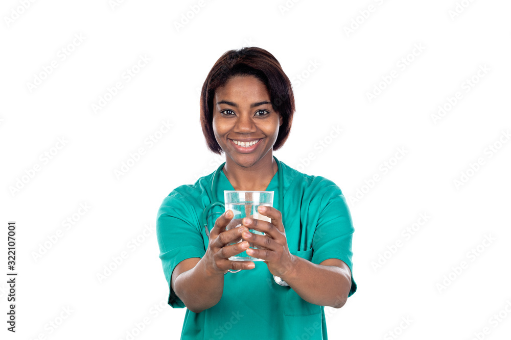 Doctor with green uniform and a glass of water