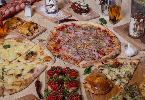 Neapolitan traditional dishes. Bruchettas, pizzas and desserts. Isolated image. Mediterranean cuisine