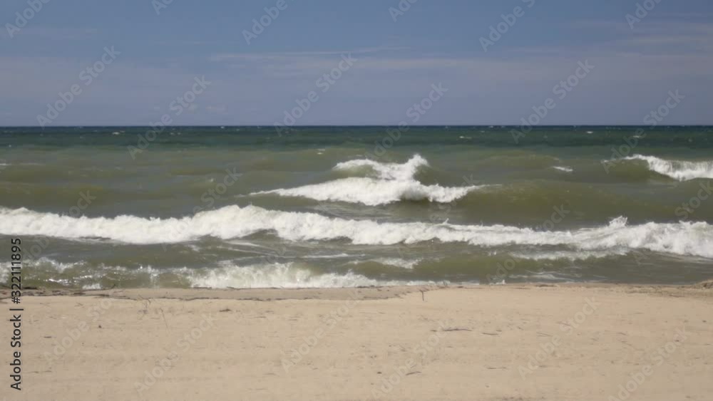 Waves crash in slow motion. Waves crash in slow motion.