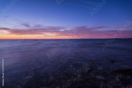 Pylon in the sea at sunrise