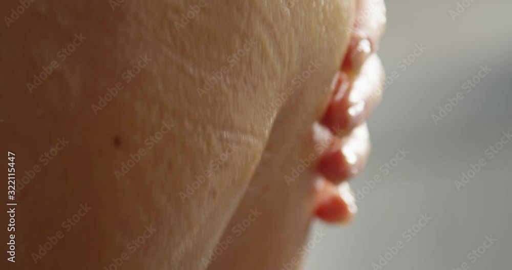 Making Massage with Honey a Closeup of Woman Hand and Shoulder a Concept of Body Care Shot on Red Making Massage with Honey a Closeup of Woman Hand and Shoulder a Concept of Body Care Shot on Red