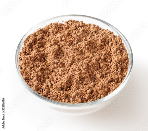 Uncooked cacao powder in glass bowl isolated on white background with clipping path