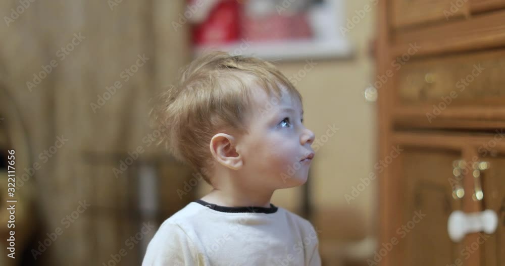 Boy on floor watching tv Boy on floor watching tv