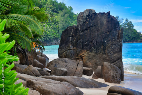 Ocean shore and rocks Mahe Island Seychelles.