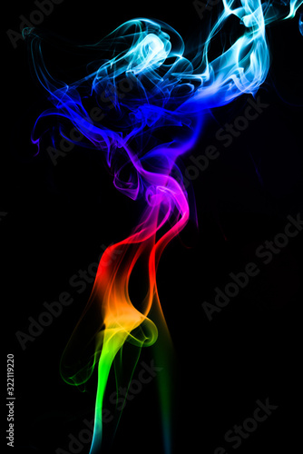 Colored smoke on black background 