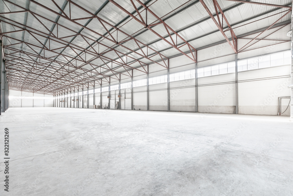 Interior of empty warehouse or garage in white colors