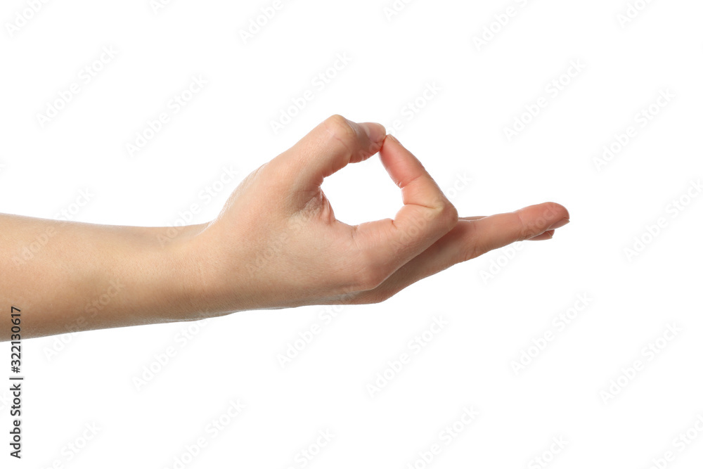 Female hand showing gesture, isolated on white background Female hand showing gesture, isolated on white background