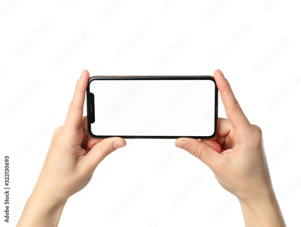 Female hands holding phone with empty screen, isolated on white background Female hands holding phone with empty screen, isolated on white background