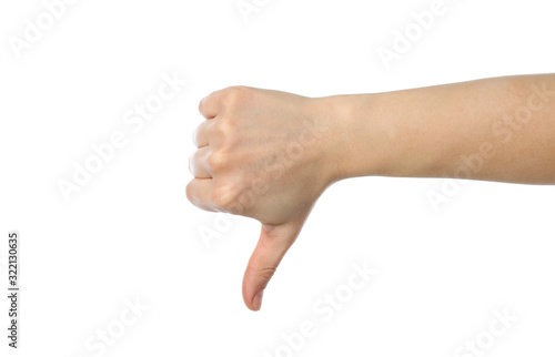 Female hand thumb down, isolated on white background