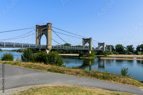 view of the langeais bridge, the river and its surroundings