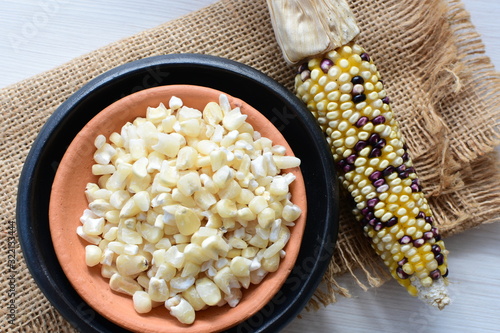 grains of natural corn in containers