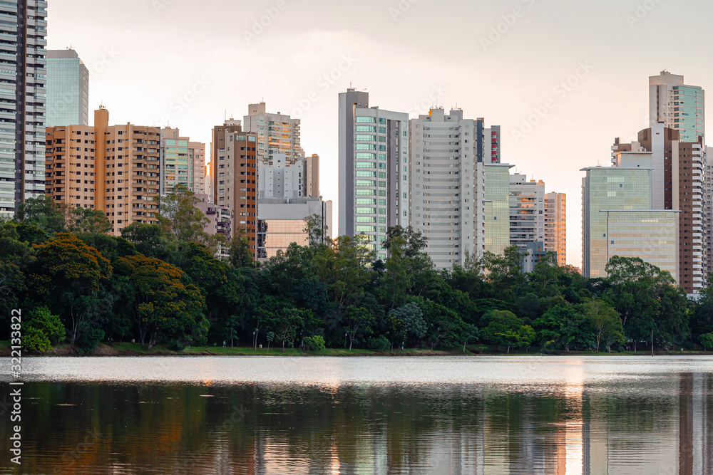 Beautiful lake of a Brazilian modern city during the sunset. Sunset at Igapo lake, Londrina PR Brazil.