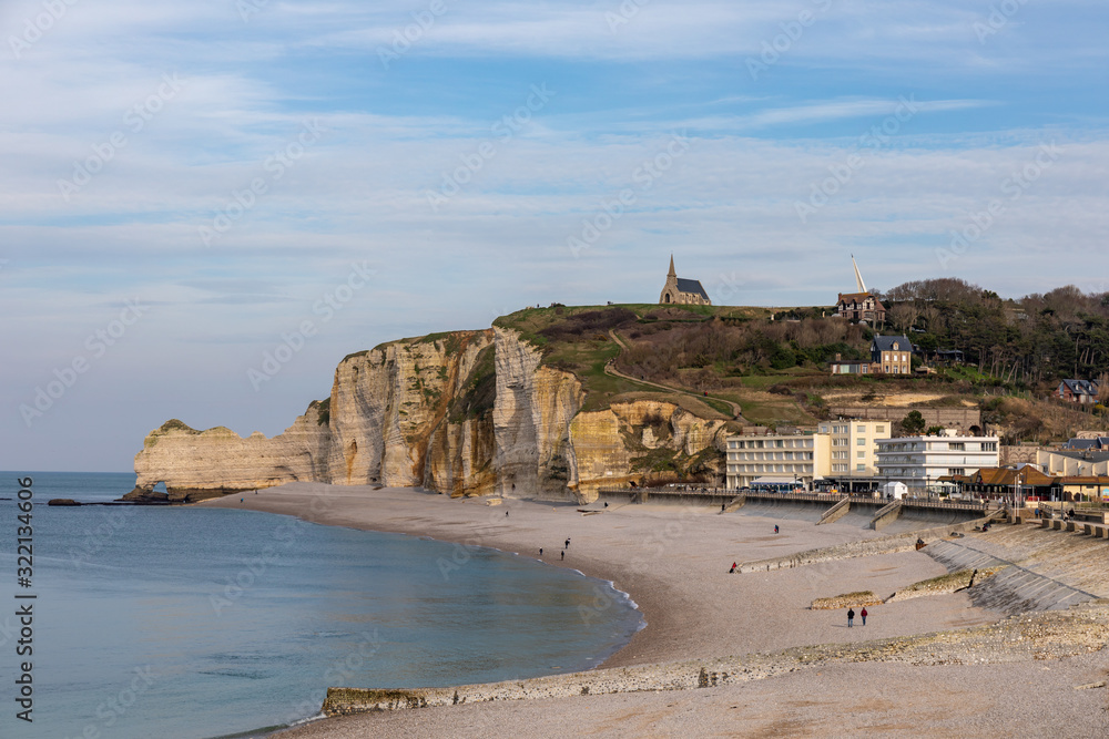 Etretat, Normandy, France - The seafront and the beach at low tide, view to the north ('Amont' cliff)