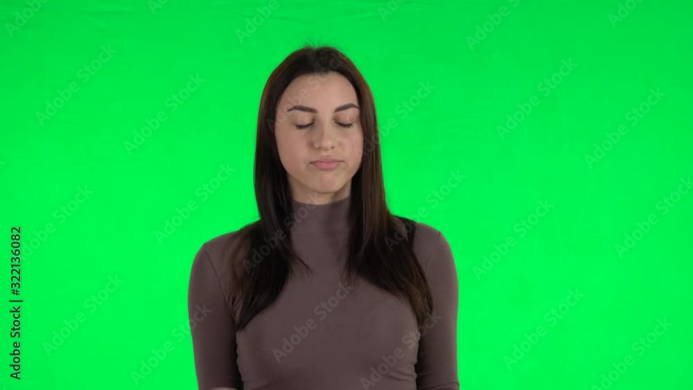 Attractive girl looking with anticipation, then very upset. Green screen Attractive girl looking with anticipation, then very upset. Green screen