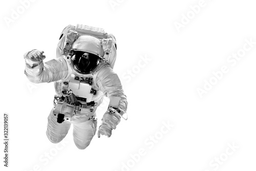 Fototapeta Naklejka Na Ścianę i Meble -  astronaut flies over the white backgrounds