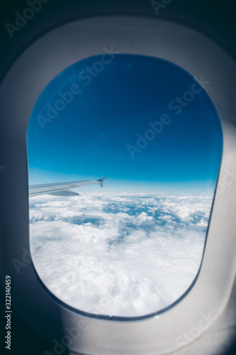 Airplane porthole window during flight