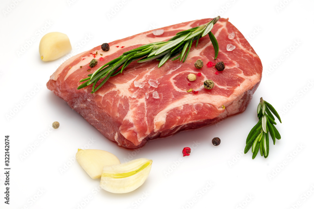 Raw meat with spices: pepper, rosemary, garlic, and salt isolated. 