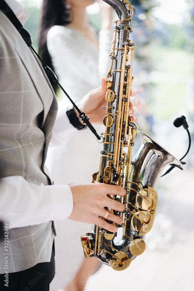 Fototapeta premium man playing saxophone