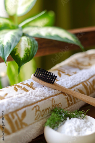 bamboo toothbrush and towel. Zero waste concept