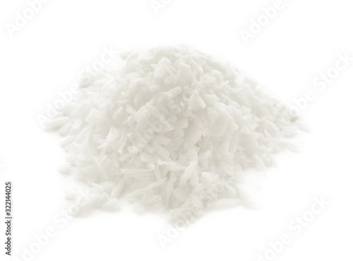 Heap of fresh coconut flakes isolated on white