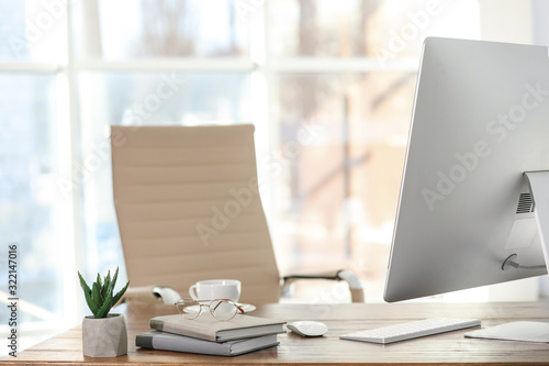 Wallpaper Mural Computer, notebooks and coffee on table in office Torontodigital.ca