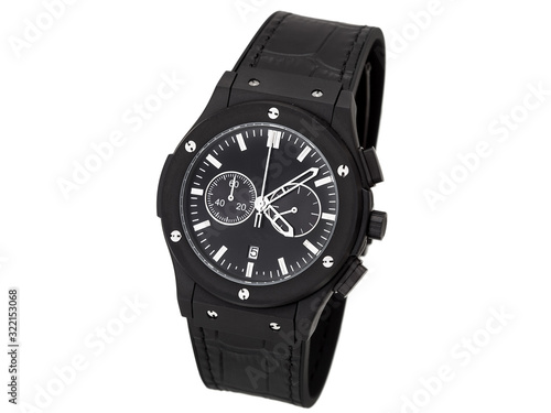 stylish men's wristwatch of black color with white arrows and a rubber strap with leather stamping isolated on a white background.
