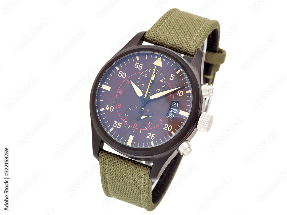 wristwatch with a green textile strap and brown iron case with arrows and numbers, isolated face of a watch on a white background. wristwatch with a green textile strap and brown iron case with arrows and numbers, isolated face of a watch on a white background.