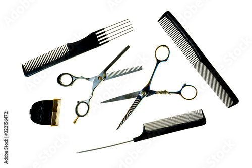 Fryzjerskie narzędzia, nożyczki i grzebienie