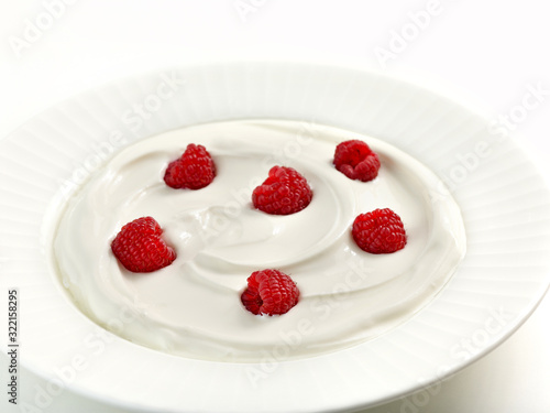 bowl of greek yogurt with fresh berries