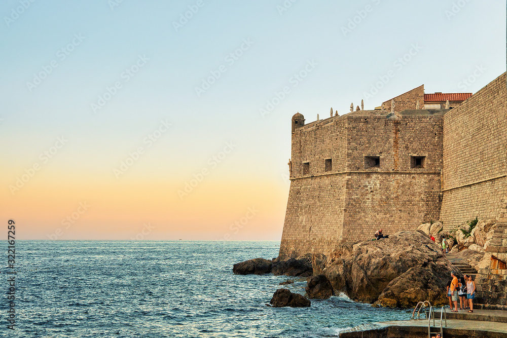 Sunset and St John Fortress in Adriatic Sea Dubrovnik