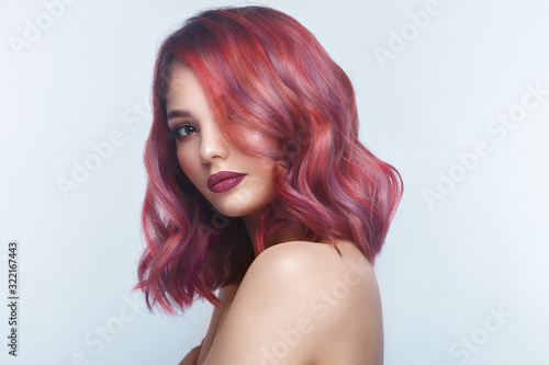 Canvas-taulu Beautiful girl with multi-colored hair and classic make-up and hairstyle