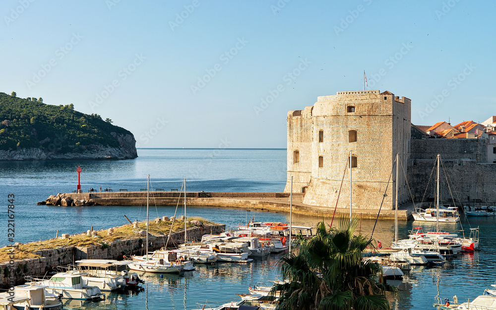 Fototapeta premium St John Fortress and sailboats in Old port in Dubrovnik