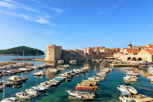 Fototapeta Naklejka Na Ścianę i Meble -  St John Fortress and sailboats at Old port in Dubrovnik