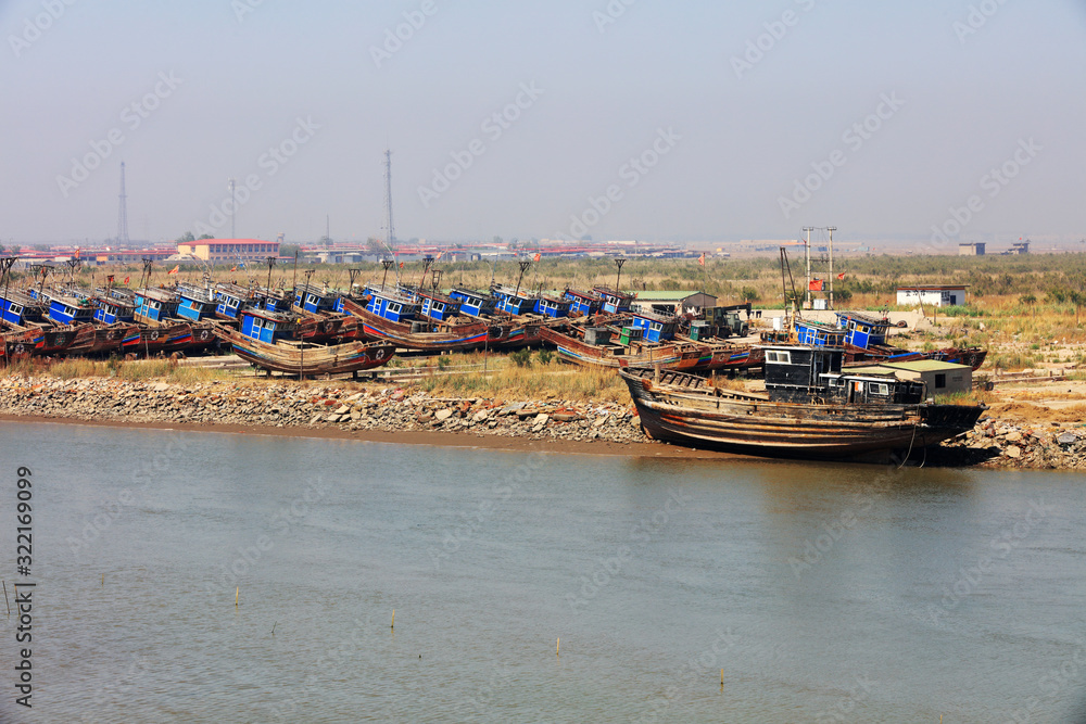 Fishing boats moored on shore land, Luannan County, Hebei Province, China