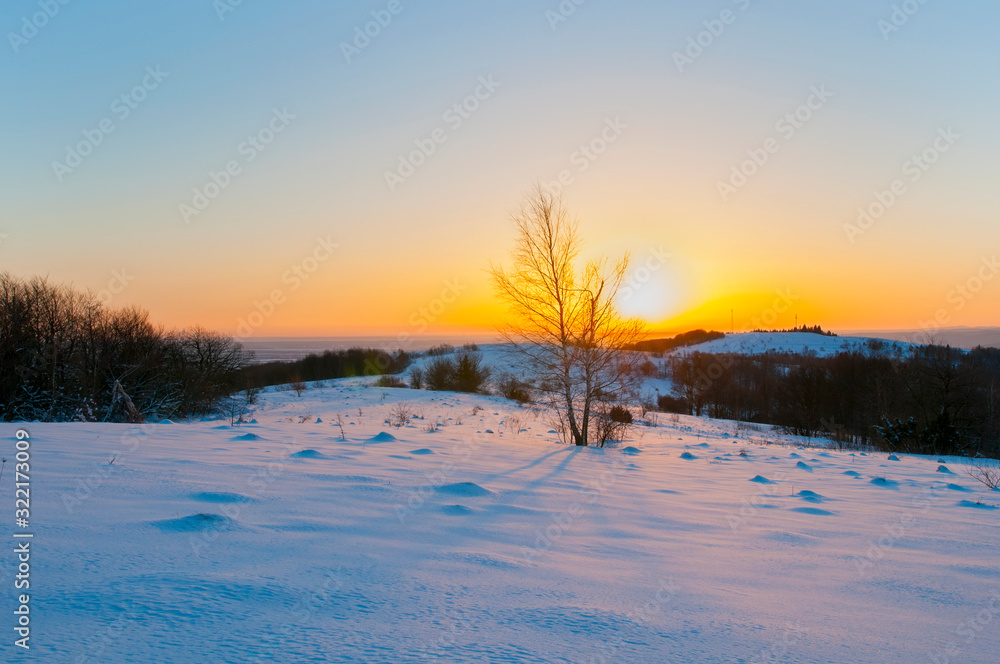 sunrise in the winter mountains on a sunny day