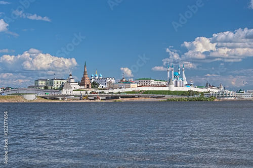 Kazan, Republic of Tatarstan, Russia. Kazan Kremlin with Presidential Palace, Soyembika Tower, Annunciation Cathedral, Qolsharif Mosque, Spasskaya Tower. View from the shore of Kazanka river. photo