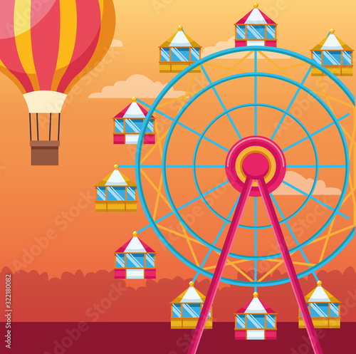 fair ferris wheel and hot air balloon over orange sunset background