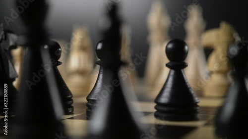 White and black pieces on chess board